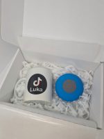 Darilni komplet: skodelica in vodoodporen bluetooth zvočnik